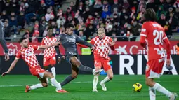 Real Madrid berhasil meraih kemenangan telak 3-0 atas Girona pada pekan ke-16 La Liga 2024/2025. (AFP/Josep Lago)