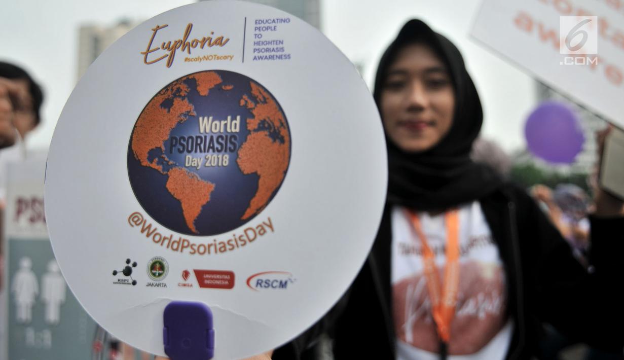 Mahasiswa dari Fakultas Kedokteran Universitas Indonesia (FKUI) menggelar kampanye tentang penyakit Psoriasis saat car free day di Jakarta, Minggu (4/11). Aksi itu bekerjasama dengan Rumah Sakit Cipto Mangunkusumo (RSCM). (Merdeka.com/Iqbal S. Nugroho)