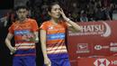 Pebulutangkis Malaysia, Tan Kian Meng / Lai Pei Jing, tampak kecewa usai dikalahkan pasangan Indonesia pada Indonesia Masters 2019 di Istora Senayan, Jakarta, Selasa (22/1). Tan / Lai gagal melangkah ke babak kedua. (Bola.com/M. Iqbal Ichsan)