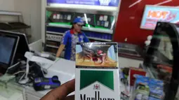 Dengan peringatan bergambar itu diharapkan jumlah perokok aktif di Indonesia bisa ditekan, Jakarta, Selasa (24/6/14). (Liputan6.com/Johan Tallo)