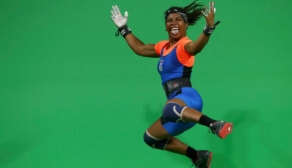 Atlet voli putri Belanda, Celeste Plak melakukan selebrasi saat bertanding melawan tim voli putri Jepang pada Olimpiade Rio 2016 di  Maracanazinho, Rio de Janeiro, Brasil, (6/8). (REUTERS/Marcelo del Pozo)
