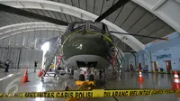 Pengadaan heli ini berawal pada 2015, ketika TNI AU ingin membeli heli yang peruntukannya buat heli VVIP kepresidenan Jakarta, Kamis (9/2). Jokowi menolak karena merasa pesawat kepresidenan Super Puma masih cukup laik. (Liputan6.com/ Widodo S.Jusuf/Pool)