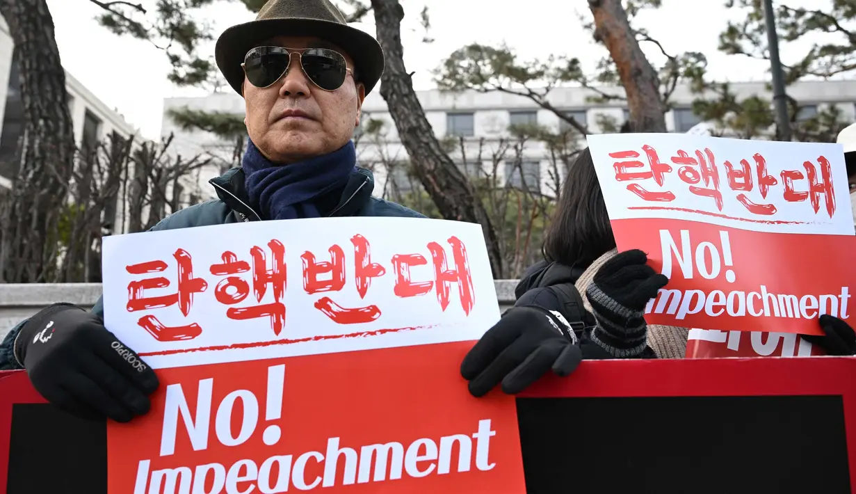 Mahkamah Konstitusi Korea Selatan menjadwal ulang sidang pembukaan pemakzulan Presiden Yoon Suk Yeol pada Kamis (16/1/2025). (Jung Yeon-je/AFP)