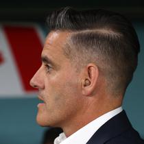 Dirangkum dari Transfermarkt, John Herdman merupakan pelatih yang berpengalaman bersama Timnas Kanada. Ia pernah tampil bersama The Reds, julukan Timnas Kanada, di Piala Dunia 2023 Qatar, (AFP/Adrian Dennis)