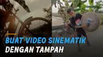 Nasib apes dialami pemuda ini saat membuat video sinematik menggunakan tampah yang digelindingkan.