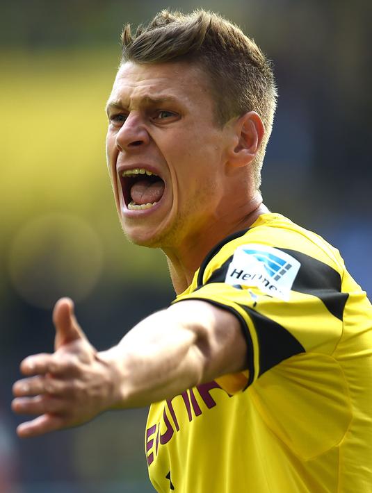 4. Lukasz Piszczek - Didatangkan secara gratis bukan berarti tidak berkualitas. Lukas justru menjadi pilihan utama Kloop di lini bek kanan. (AFP/Patrik Stollarz)