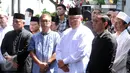 Presiden ke-6 RI, Susilo Bambang Yudhoyono (tengah) saat menghadiri penghormatan terakhir jenazah Ketua KPU Husni Kamil Manik di Kompleks KPU, Jakarta, Jumat (8/7). Husni Kamil Manik wafat di usia 40 tahun. (Liputan6.com/Helmi Fithriansyah)