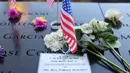 Setiap tahunnya, kerabat korban serangan 9/11 berkumpul untuk mengenang orang-orang yang mereka cintai dalam peristiwa tersebut. (Michael M. Santiago/Getty Images North America/Getty Images via AFP)