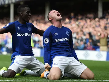 Ekspresi Wayne Rooney usai mencetak gol ke gawang Stoke City pada laga perdana Premier League di Goodison Park, Liverpool (12/8/2017). Everton menang 1-0. (AFP/Oli Scarff)
