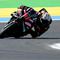 Pembalap Aprilia Racing Team, Marco Bezzecchi, berhasil meraih podium juara di MotoGP Amerika Serikat 2026 yang berlangsung di Circuit of the Americas (COTA), Austin, Senin (30/3/2026) dini hari WIB. (AFP/EVARISTO SA)