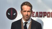 Pemeran utama film Deadpool, Ryan Reynolds berpose untuk sesi foto saat menghadiri pemutaran khusus "Deadpool 2" di AMC Loews Lincoln Square, New York (14/5). (AFP/Hector Retamal)