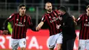 Gennaro Gattuso dan Leonardo Bonucci merayakan kemenangan timnya asal Sampdoria pada lanjutan Liga Serie A Italia di stadion San Siro (18/2). AC Milan menang atas Sampdoria dengan skor 1-0. (AFP Photo/Miguel Medina)