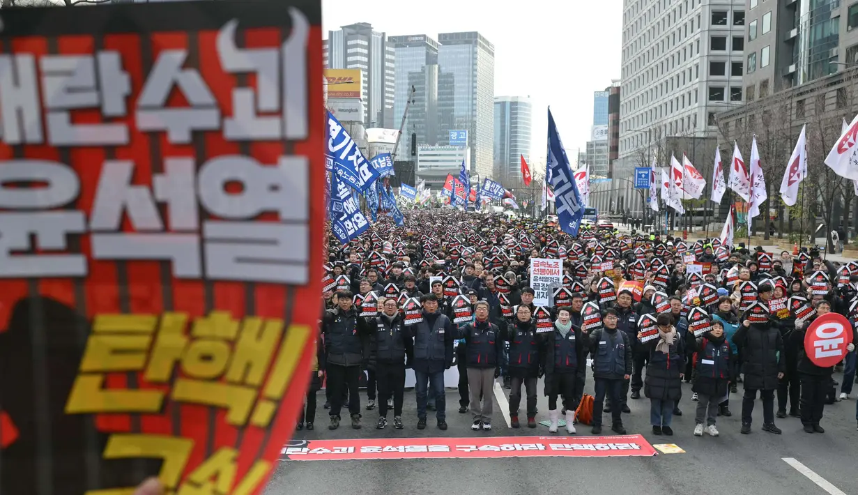Mereka mendesak pemakzulan Presiden Korea Selatan Yoon Suk Yeol. (ANTHONY WALLACE/AFP)