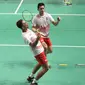 Ganda putra Indonesia, Fajar Alfian/M Rian Ardianto merayakan kemenangan atas pemain Jepang, Takuto Inoue/Yuki Kaneko pada semifinal Bulutangkis Beregu Putra Asian Games 2018 di Jakarta, Selasa (21/8). (Liputan6.com/Helmi Fithriansyah)