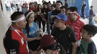 Suporter mengantre untuk menyaksikan laga final Indonesia Open di Istora Senayan, Minggu, (8/7/2018). (Bola.com/M Iqbal Ichsan)