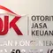 Tulisan OJK terpampang di Kantor Otoritas Jasa Keuangan (OJK), Jakarta. (Liputan6.com/Angga Yuniar)