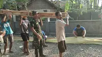 Kegiatan TNI Manunggal Masuk Desa (TMMD) reguler Kodim 0510/Trs. (Liputan6.com/Pramita Tristiawati)