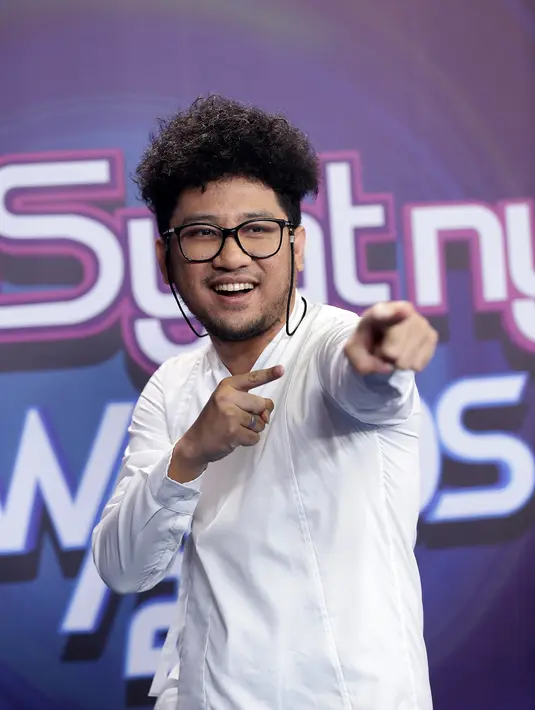 "Pengen ke Belanda, kan istri saya sempet S2 di Belanda. Dia mau ngajak aku keliling ketempat-tempat dia selama disana," ungkap Kunto Aji. (Andy Masela/Bintang.com)