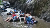 River Tubung, salah satu olahraga sekaligus wisata yang ditawarkan desa Wisata Sindang Kasih, Cilawu, Garut, Jawa Barat (Liputan6.com/Jayadi Supriadin)