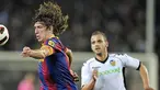Aksi kapten Barcelona Carles Puyol pada pertandingan La Liga melawan Valencia di Nou Camp pada 16 Oktober 2010. AFP PHOTO/JOSEP LAGO