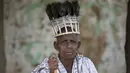 Seorang pengikut Ramnami Samaj menato sekujur tubuhnya di desa Jamgahan, India, 17 November 2015. Konon tato ini dilukis di tubuh mereka untuk bentuk protes atas ketidakadilan kaumnya pada saat itu. (REUTERS / Adnan Abidi)