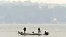 <p>Sebagaimana diberitakan Reuters, Departemen Konservasi Lingkungan Negara Bagian New York telah mengeluarkan peringatan kesehatan untuk beberapa county, termasuk New York, Bronx, dan Queens. (Kevin Rivoli/The Citizen via AP)</p>
