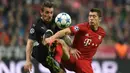 5. Mathieu Debuchy, Telegraph melaporkan jika AS Roma berencana mendatangkan bek Prancis ini ke Liga Italia. Bek sayap kanan ini masuk dalam daftar pemain yang akan dijual oleh Arsenal musim ini. (AFP/Christof Stache)