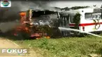 Dugaan sementara, sumber api berasal dari puntung rokok yang dibuang di dekat bus yang terparkir.