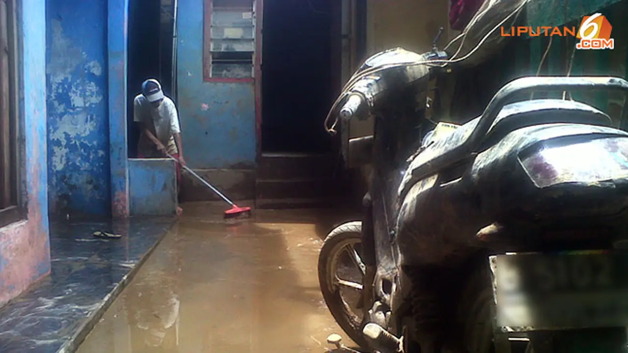 bersih-banjir130123b.jpg