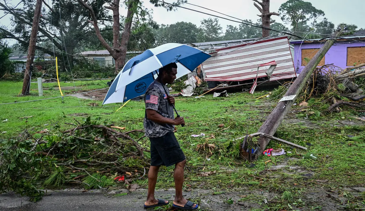 Meski demikian, Badai Milton itu tidak memicu lonjakan permukaan air laut yang dicemaskan sebelumnya. (GIORGIO VIERA/AFP)