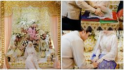 Begini detail dekorasi prosesi adat Peusijeuk dan Boh Gaca yang dijalani oleh Dea Sahirah. Nuansa emas selaras dengan busana yang dikenakan oleh Dea Sahirah. Tak hanya detail dekorasi, wanita yang diketahui lahir pada Juli 1997 ini juga bagikan detail perlengkapan yang dipakai untuk menjalani prosesi adat Aceh tersebut, seperti batu giling hingga daun pacar. (Liputan6.com/IG/@deasahirah)