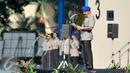 Kapolri Jenderal Polisi Badrodin pimpin upacara HUT ke-65 Polisi Air dan Udara (Polairud) di Markas Korps Direktorat Polisi Udara Baharkam Polri, Pondok Cabe, Pamulang, Tangerang Selatan, Senin (1/12). (Liputan6.com/Yoppy Renato)