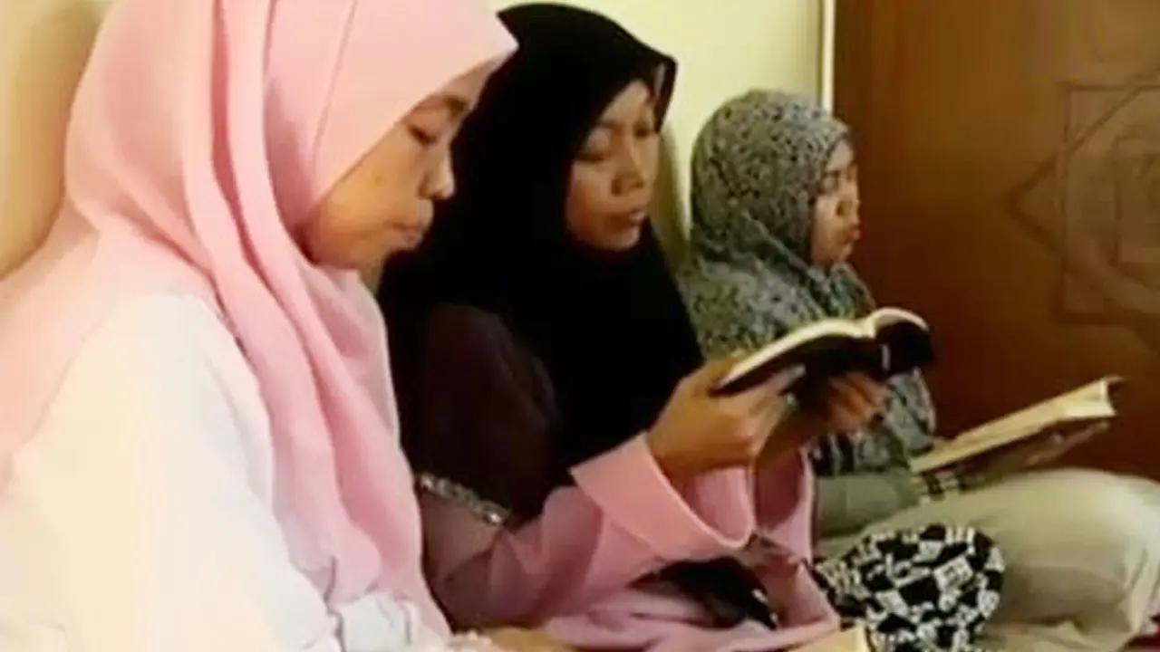 Membaca Alquran 