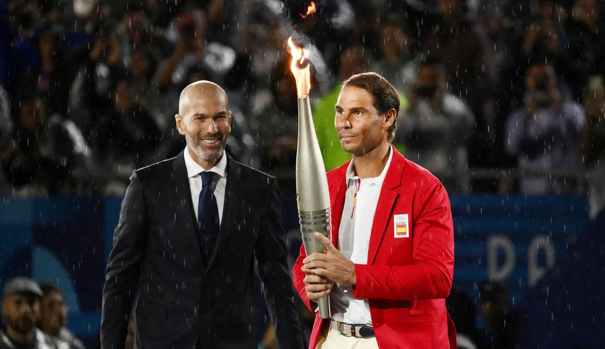 Upacara Pembukaan Olimpiade Paris 2024 berlangsung meriah di Sungai Seine, Prancis, pada Sabtu (27/7/2024) dini hari WIB. (AFP/Jeff Pachoud)