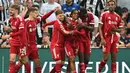 Gol tersebut membuat Liverpool menang 3-2 atas Newcastle. Selain itu, hasil tersebut juga mengantar The Reds bertengger di peringkat tiga klasemen dengan total 6 poin dari dua pertandingan. (AFP/Andy Buchanan)