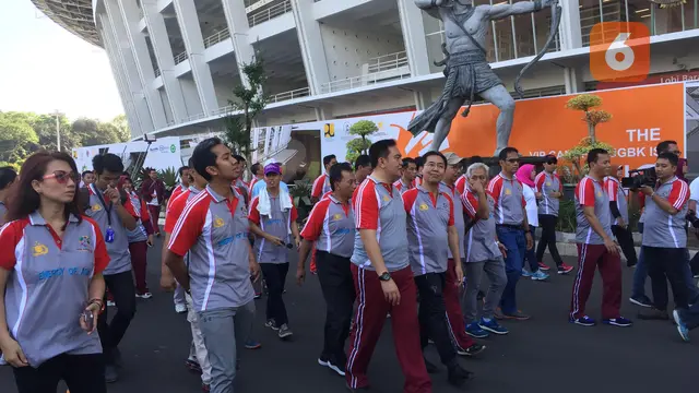 Kepolisian Republik Indonesia (Polri), Pusat Pengelola Kompleks GBK (PPK GBK), dan Indonesia Asian Games 2018 Organizing Committee (Inasgoc), menggelar olahraga jelang Asian Games 2018 Jakarta-Palembang di SUGBK, Senayan, Jakarta, Jumat (13/4/2018)