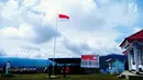 Suasana upacara pengibaran bendera di Kantor Pemerintah Kabupaten Jayawijaya, Provinsi Papua, Kamis (17/8). Upacara yang diikuti petugas pukesmas beserta jajarannya itu memperingati HUT ke-72 Republik Indonesia. (Foto: Fitri Haryanti Harsono)