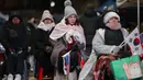 Suhu dingin tidak menyurutkan semangat pendukung menentang penangkapan Presiden Korea Selatan yang dimakzulkan, Yoon Suk Yeol. (Anthony WALLACE/AFP)