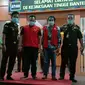 Tersangka Korupsi Masker Nakes Di Kejati Banten. (Kamis, 27/05/2021). (Liputan6.com/Yandhi Deslatama).