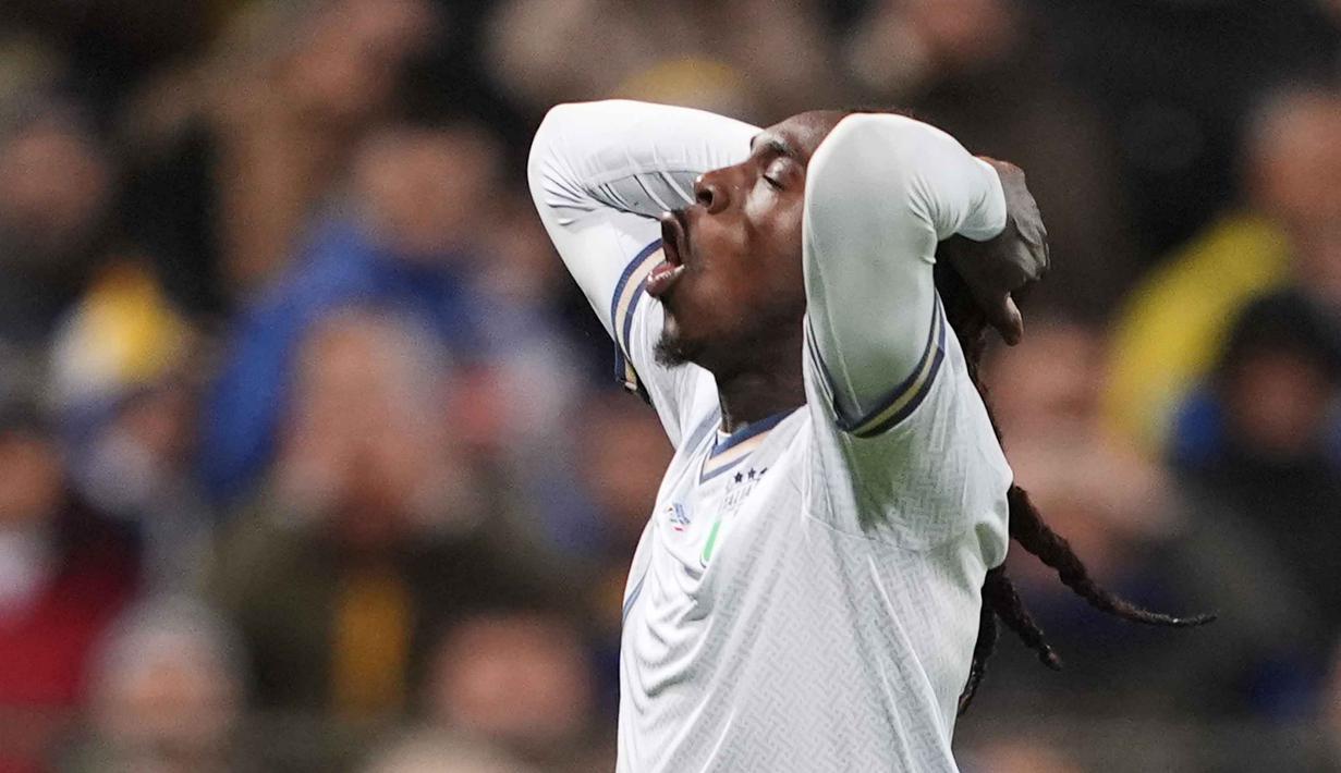 Ini menjadi catatan memilukan bagi kolektor empat gelar juara dunia. Tampak dalam foto, ekspresi pemain Timnas Italia, Moise Kean, saat pertandingan final play-off kualifikasi Piala Dunia 2026 melawan Bosnia dan Herzegovina di Stadion Bilino Polje, Zenica, Selasa 31 Maret 2026 waktu setempat atau Rabu 1 April 2026 dini hari WIB. (Fabio Ferrari/LaPresse via AP)