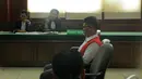 Ahmad Imam Al Hafitd saat menghadiri sidang lanjutan yang beragendakan pembacaan tuntutan dari Jaksa, Pengadilan Negeri, Jakpus, Selasa (4/11/2014).(Liputan6.com/Faisal R Syam)