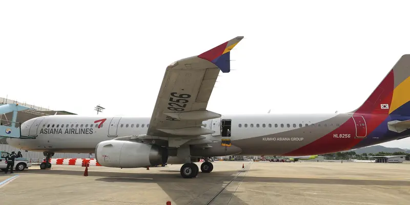 Penampakan Pintu Darurat Pesawat Asiana Airlines yang Terbuka di Udara