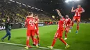 Hasil itu membuat Die Roten kukuh di puncak klasemen sementara dengan koleksi 63 poin atau terpaut 11 angka dari peringkat kedua yang dihuni Borussia Dortmund. (AFP/Ina Fassbender)