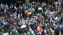 Dukungan mereka untuk pembebasan Palestina itu semakin kompak dengan berbagai atribut yang dibawa. (Liputan6.com/Faizal Fanani)
