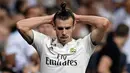 Striker Real Madrid, Gareth Bale, tampak kecewa saat melawan Atletico Madrid pada laga La liga di Stadion Santiago Bernabeu, Madrid, Sabtu (29/9/2018). Kedua klub bermain imbang 0-0. (AFP/Oscar Del Pozo)