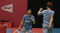 Kevin Sanjaya dan Marcus Gideon menang atas pasangan Rian Agung dan Hendra Setiawan pada babak kedua Daihatsu Indonesia Master 2018 di Istora Senayan, Kamis (25/1/2018). Kevin/Gideon menang 21-16 23-2.1 (Bola.com/Nick Ha
