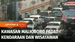 Libur panjang akhir pekan, kawasan Malioboro, Yogyakarta, dipadati wisatawan. Keramaian wisatawan membuat jalan di sepanjang Malioboro macet.