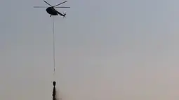 BNPB Kerahkan Dua Water Bombing ke TPA Jatiwaringin