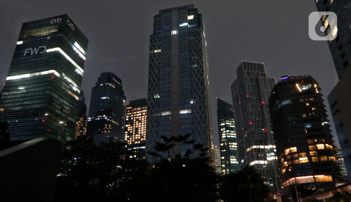Dalam perayaan "Earth Hour" dengan mematikan lampu selama 90 menit di kawasan itu mengajak masyarakat untuk peduli pada lingkungan hidup dan pemanasan global. (Liputan6.com/Angga Yuniar)