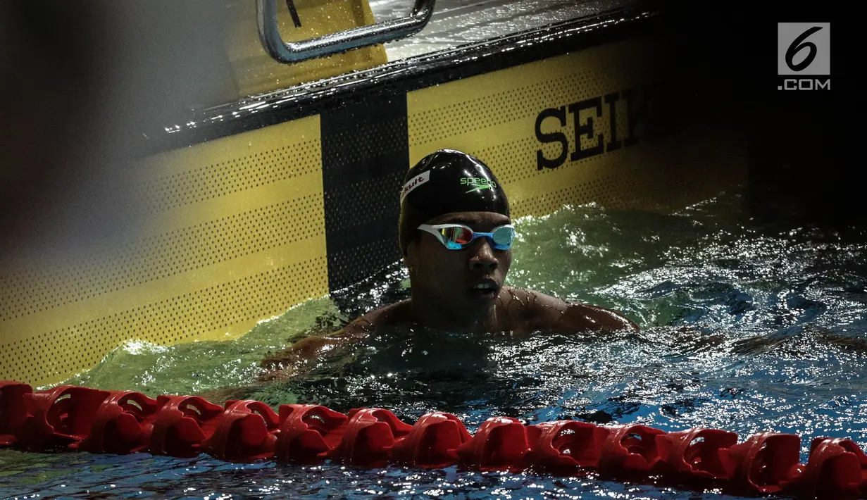 Perenang Indonesia  Triady Fauzi Sidiq tampil di nomor 100 meter gaya bebas SEA Games 2017 di National Aquatic Centre, Malaysia, (23/8). Triady Fauzi Sidiq berhasil membawa medali perak dalam kategori 100 Meter gaya bebas. (Liputan6.com/Faizal Fanani)